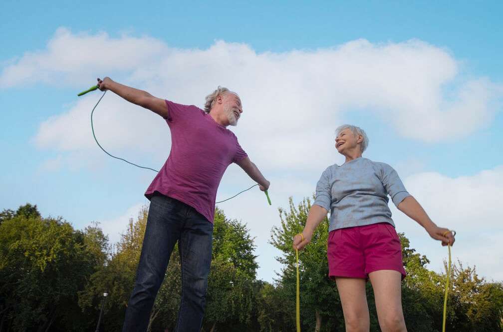 senior couple staying active during the summer