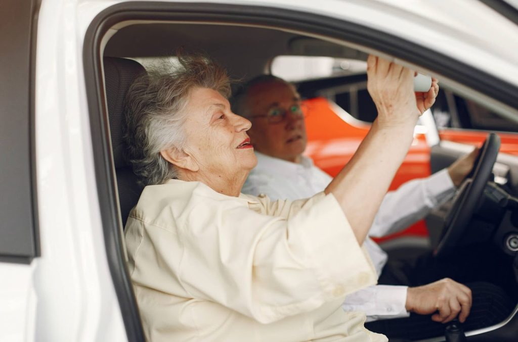 senior couple sitting in the car