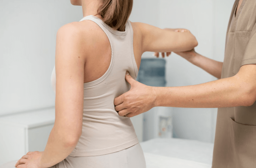 woman at physical therapy for back pain