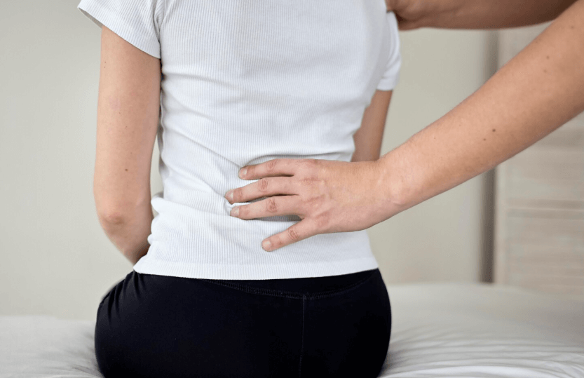 woman with back pain